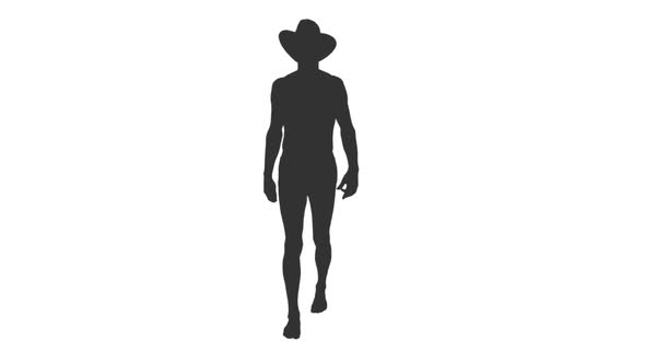 Silhouette of Shirtless Man Walking in Swim Trunks and Cowboy Hat