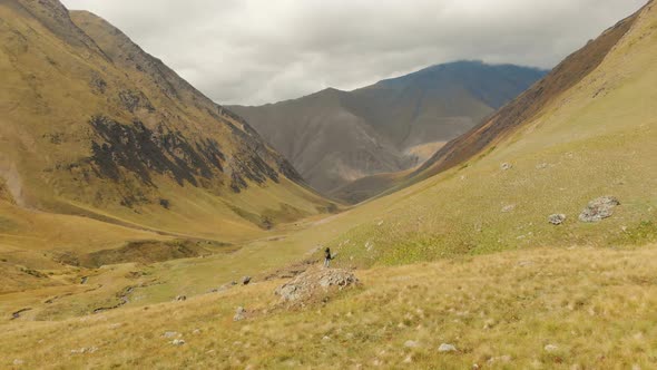 Traveller Stands On Rock In Scenic Juta Valley