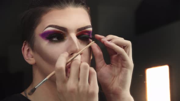 Drag Artist  Young Man Gluing Down Big Fake Eyelashes To His Eyes