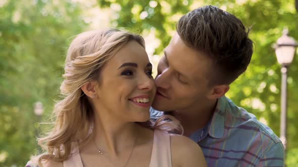 Young Woman Waiting for Boyfriend in Park, Happy Man Hugging Girlfriend, Love