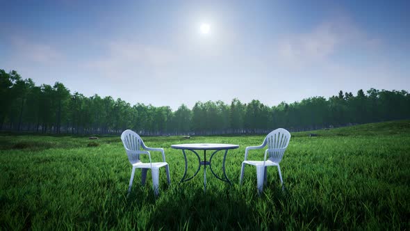 Round Table And Chairs On The Grass Field Garden Timelapse Scene 4K 02