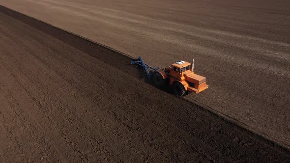 Agriculture Modern Yellow Powerful Tractor Plows Farm Field