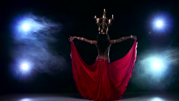 Attractive Belly Dancer Girl Continue Dancing with Candles on Her Head, Black, Smoke