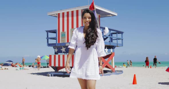 Happy Girl on Tropical Beach Posing