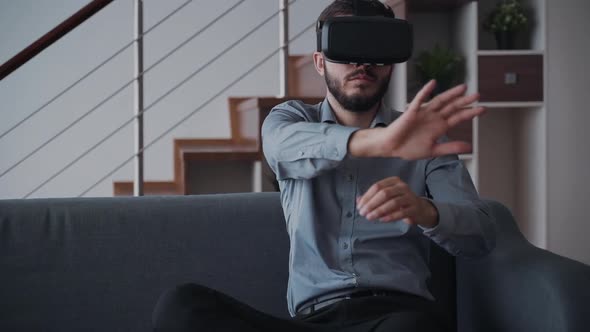 Creative Man Is Playing in Fight Video Game Using New Digital Technology Device of Virtual Reality