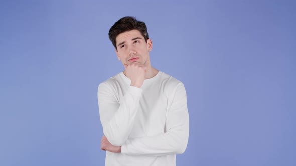 Thinking Man Looking Up on Violet Background