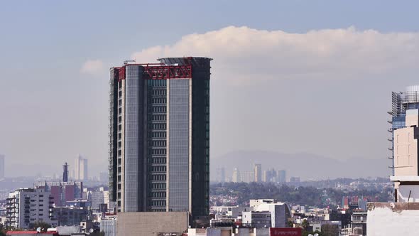 Mexico City skyscraper building timelapse, day still shot of cityscape horizon
