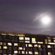 Time-lapse of the exterior of a modern apartment block at night - VideoHive Item for Sale
