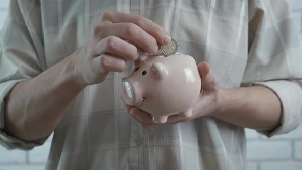 Donation in piggy bank. 