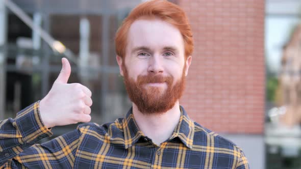 Thumbs Up by Redhead Beard Young Man, Outdoor