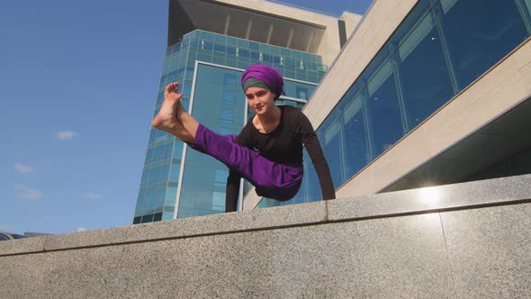 Bottom View Muslim Islamic Strong Athletic Woman Strength Power Girl in Hijab Doing Balance on Hands