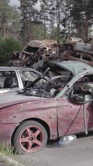 Vertical Video of a Dump of Destroyed Cars During the War in Ukraine