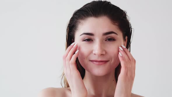 Skincare Routine Relaxed Woman Applying Face Cream