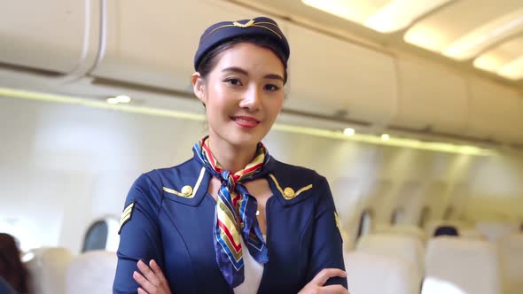 Cabin Crew or Air Hostess Working in Airplane