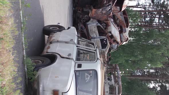 Vertical Video of a Dump of Cars Destroyed By the War in Ukraine