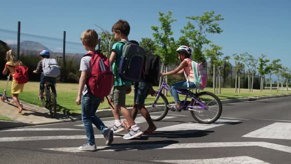 Group of kids crossing the road