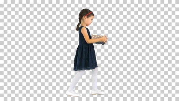 Little girl in black dress walking with, Alpha Channel