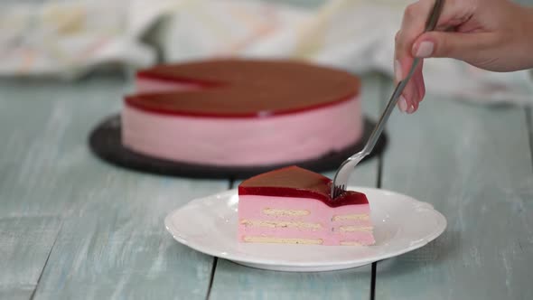 Piece of Raspberry Cream Cakes with Jelly.