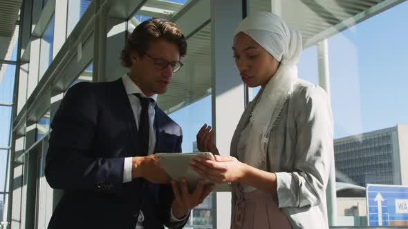 Young business people talking in a modern office