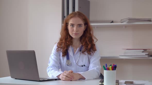 Portrait Woman Talking in Hospital