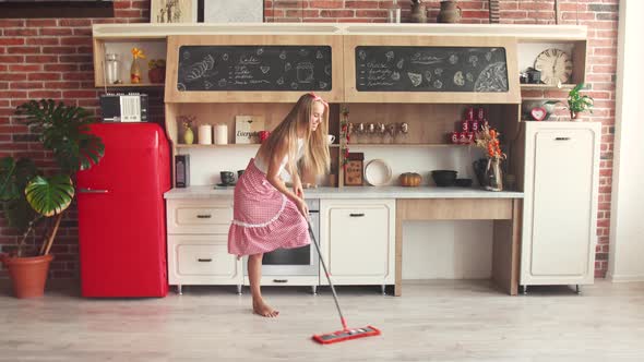 Woman Mopping the Floor Cheerfully