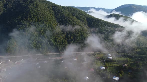 Sunny And Foggy Morning In The Mountain Village