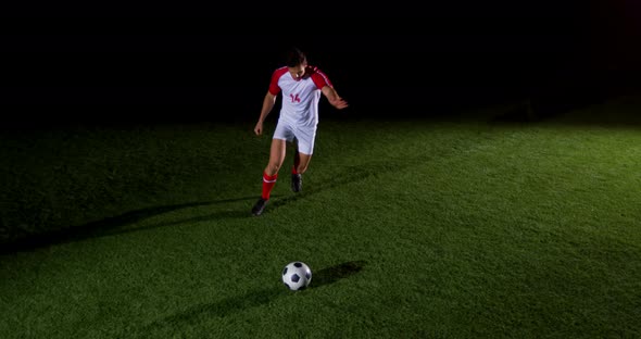 Soccer player kicking the ball 4k