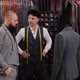 Slow motion of handsome man choosing a suit design with tailor in atelier - VideoHive Item for Sale