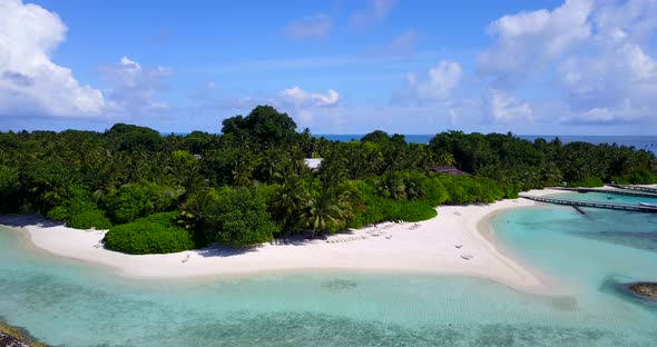 Wide drone abstract view of a summer white paradise sand beach and blue water background in colourfu