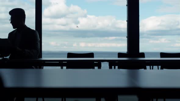 Coworkers Silhouettes Working Office at Panorama Window