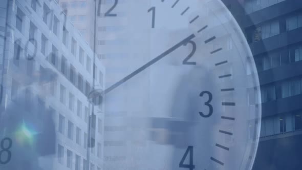 People walking fast in the city with clock in the foreground