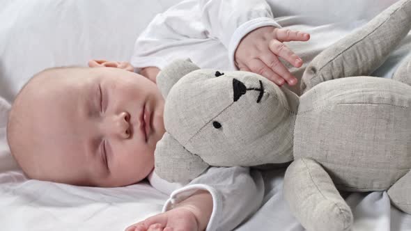 Baby Sleeping with Toy alt