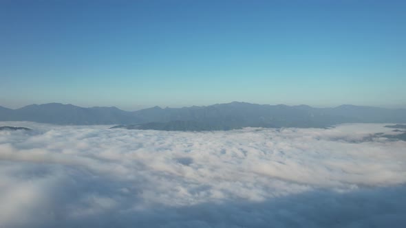 Landscape of mountains peak and with the sea of fog