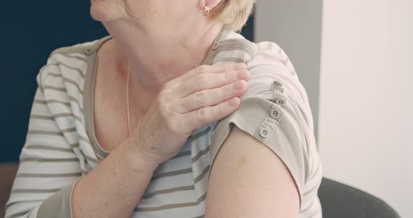 An Elderly Woman Get a Vaccine for Coronavirus