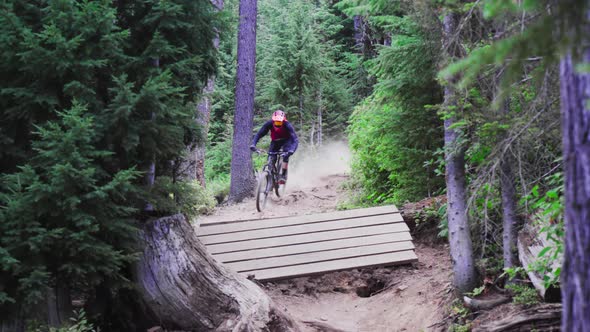 Mountain Biker- Going over ramp