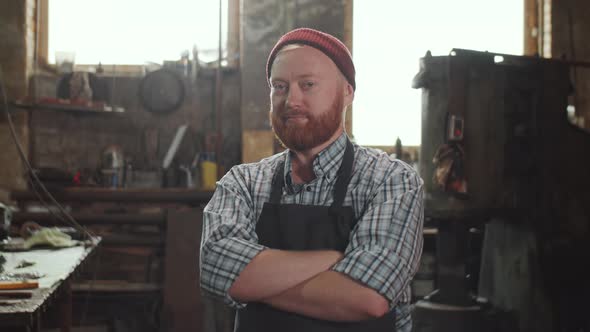 Portrait of Blacksmith in Smithy