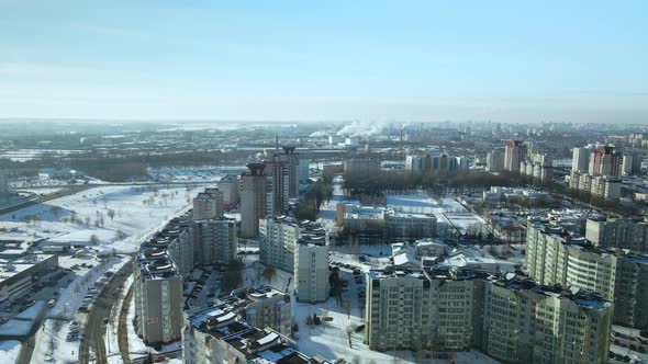 City quarters. Multi-story houses. Winter cityscape.