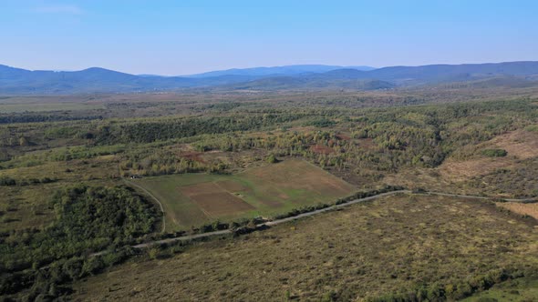 Aerial View of Mountains Scenic Overlook Forest Highlands Farmland Cultivated Field From of the