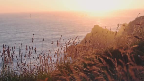 Beautiful Sun-Kissed Shining Across The Ocean In Guernsey Island - Static Shot