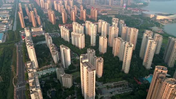 Aerial Drone Shot Over Residential Apartment Buildings on Sunset