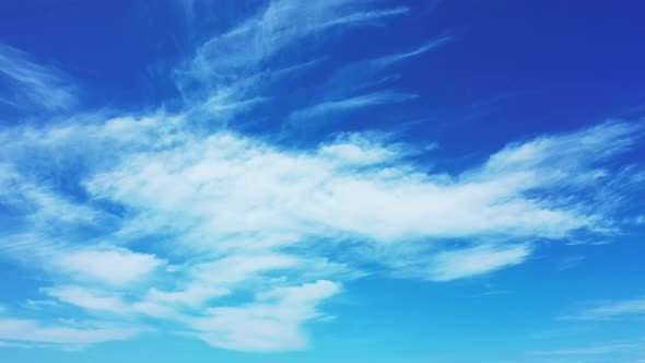 Wide fly over abstract shot of a white sand paradise beach and aqua blue ocean background in best qu