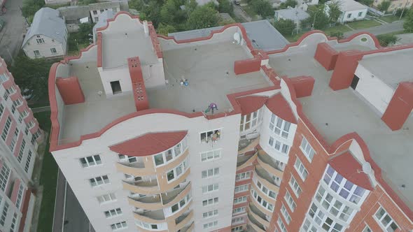 Aerial view of workers on a building top