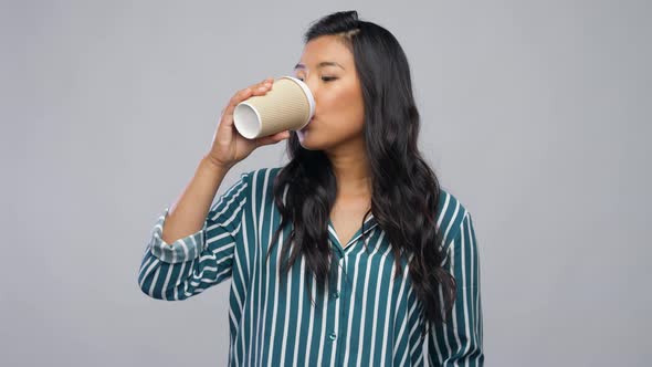 Happy Asian Woman Drinking Coffee