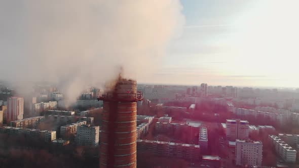 Air Pollution Problem - a Big Industrial Pipe Pollutes the Air in the City