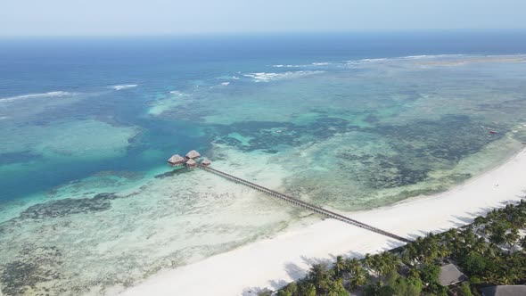 Aerial View of a House on Stilts in the Ocean on the Coast of Zanzibar Tanzania Slow Motion