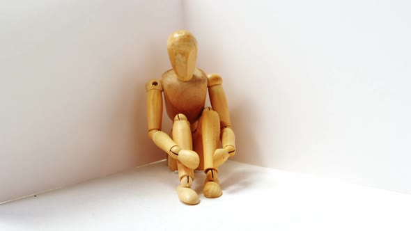 Figurine in sad pose
