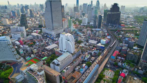 4K UHD : Aerial view over the Chao Phraya River and Buildings of Bangkok