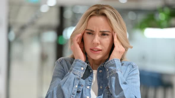 Young Casual Woman Having Headache 