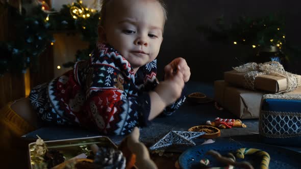 Playful Kid Decorating Christmas Presents