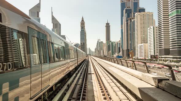 Modern Driverless Metro Train Rush Forward, Along Night Dubai, Front Cabin POV View, Smooth